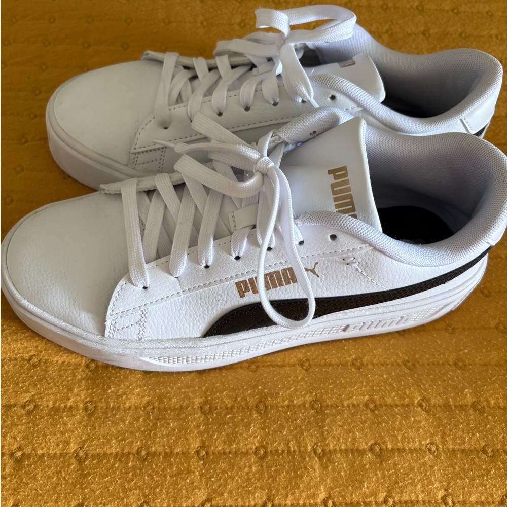 Puma White Sneakers with Black and Gold Accents